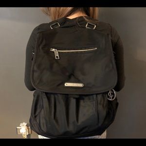 Juicy Couture shoulder bag convertible backpack.